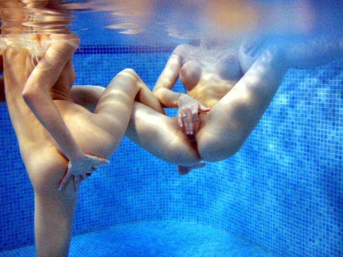 Naked swimmers in the pool