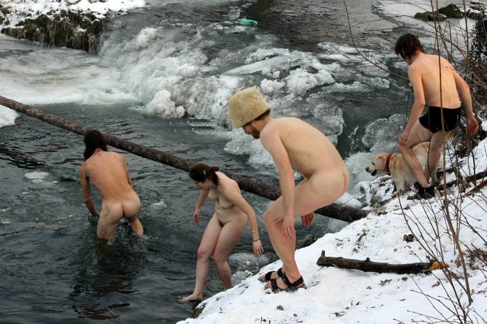 Naked woman on the river 75 years old