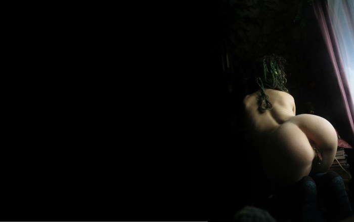Naked chicks on a dark background