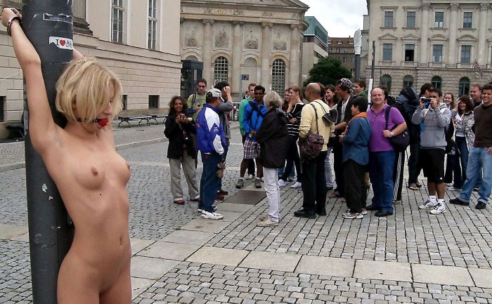 Public humiliation of a slave on the street