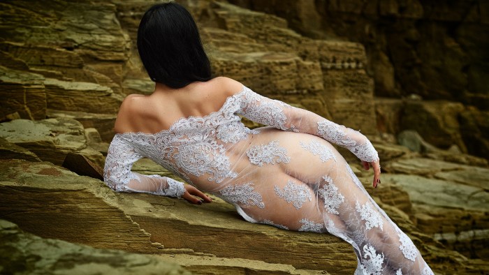 In a transparent nightie without panties
