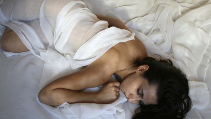 Naked priest from under the covers