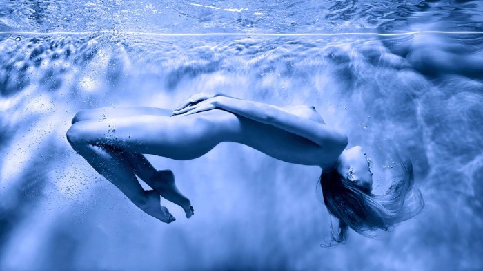 Naked beauties underwater