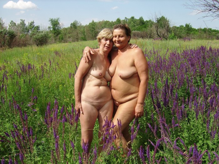 Naked mature pairs in nature
