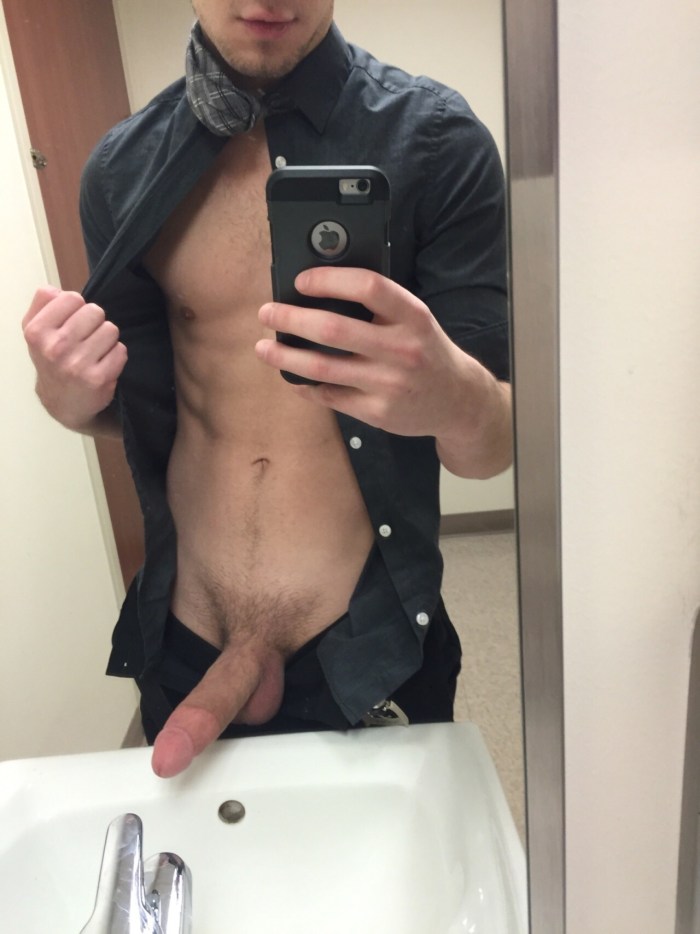 Naked guy with a member in the mirror
