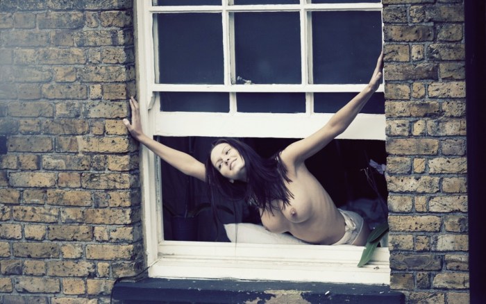 Girl in the window naked