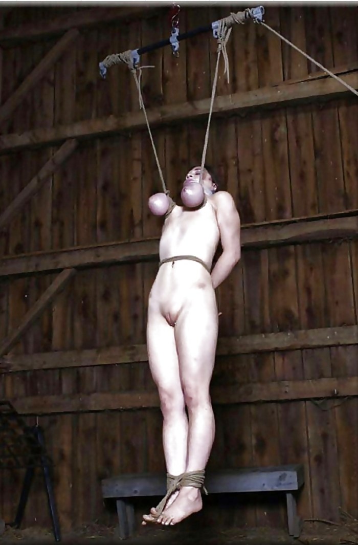 BDSM suspension on the hole