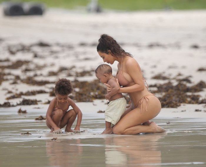 Naked woman with a baby