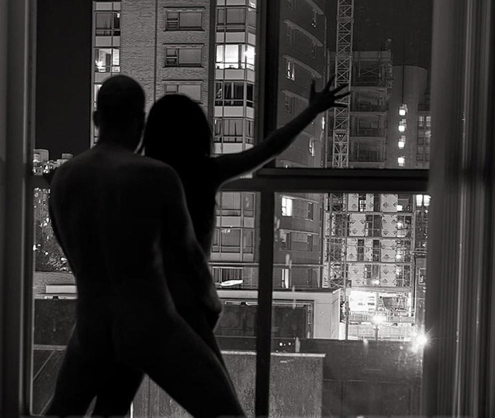 Fuck by the window of skyscraper