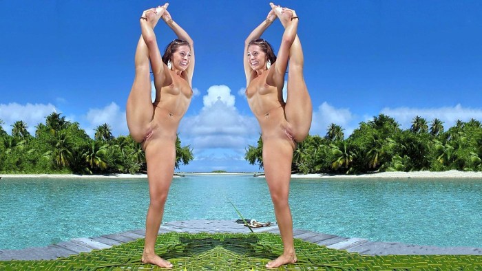 Naked women with extended legs sitting