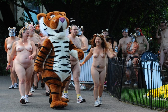 Parade of naked men and women