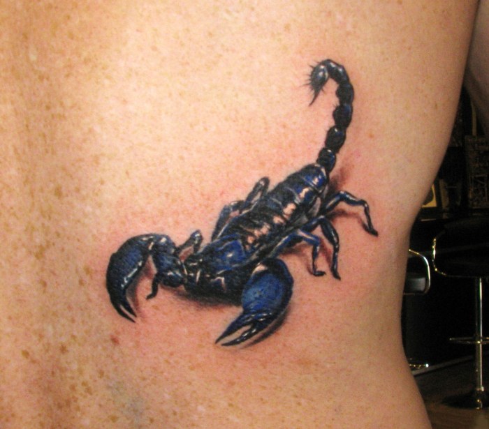 Scorpio Tattoo Realism on the inside of Biceps
