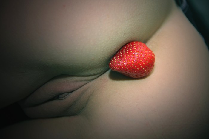 Women's pussy with strawberries