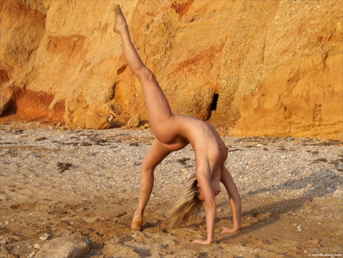 Poses for an erotic photo shoot
