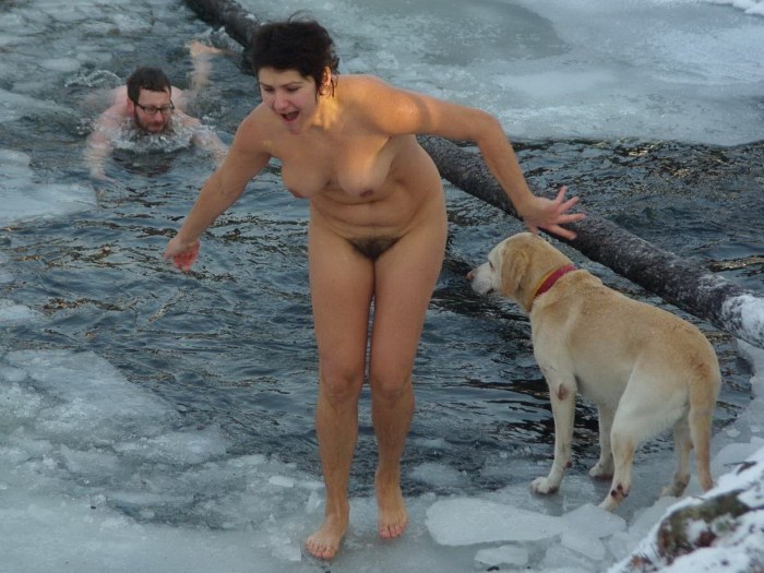 Naked walruses bathe in the hole