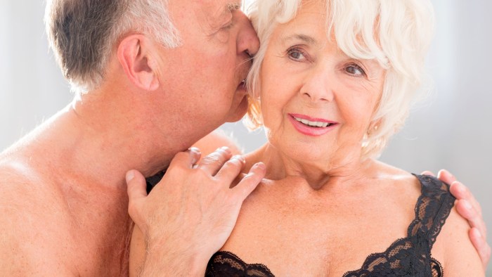 Kiss on the cheek between the elderly men