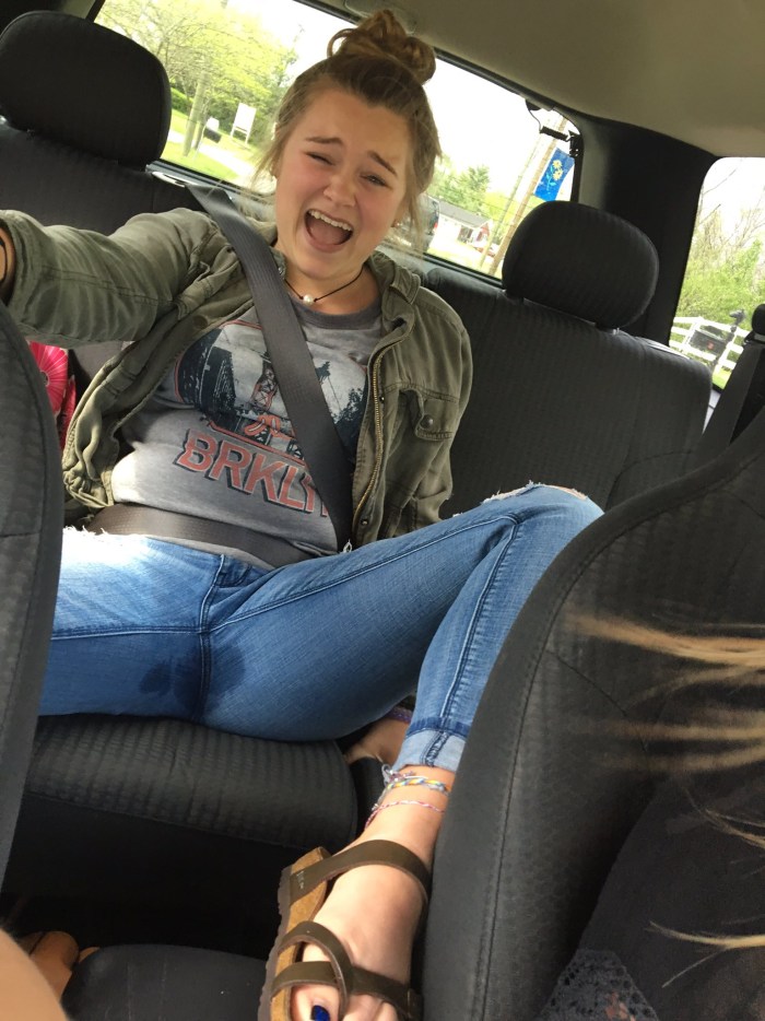 Pee Women in car in jeans