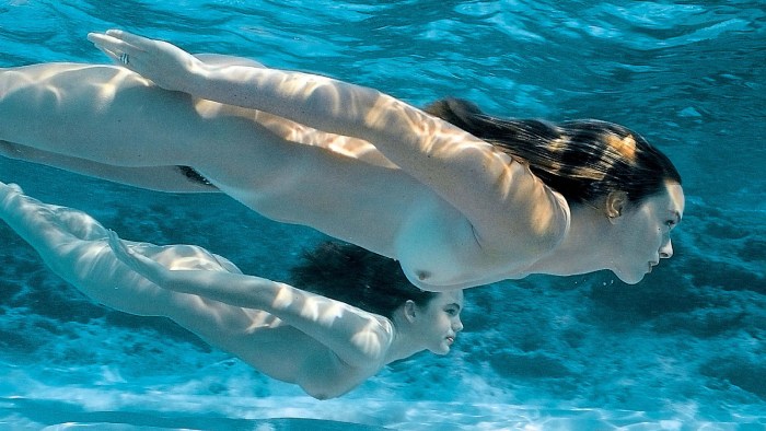 Naked woman in flippers