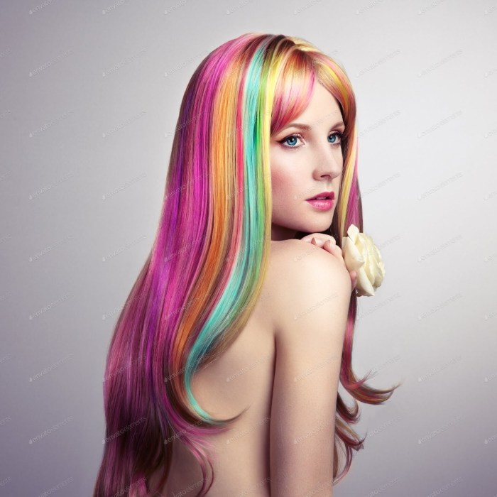 Beauty fashion model girl with colorful painted hair
