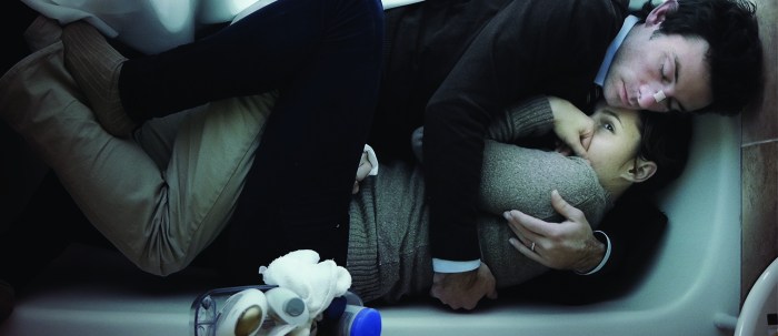 Hugs tightly in bed