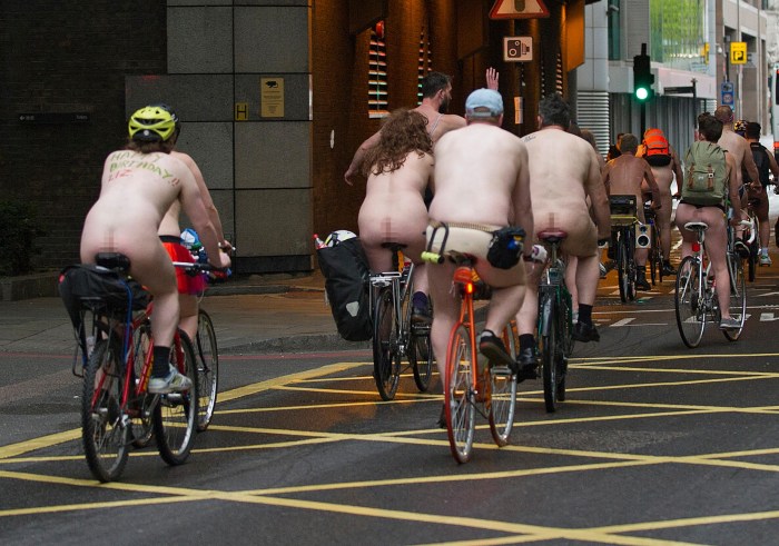 Naked on a motorcycle in the city