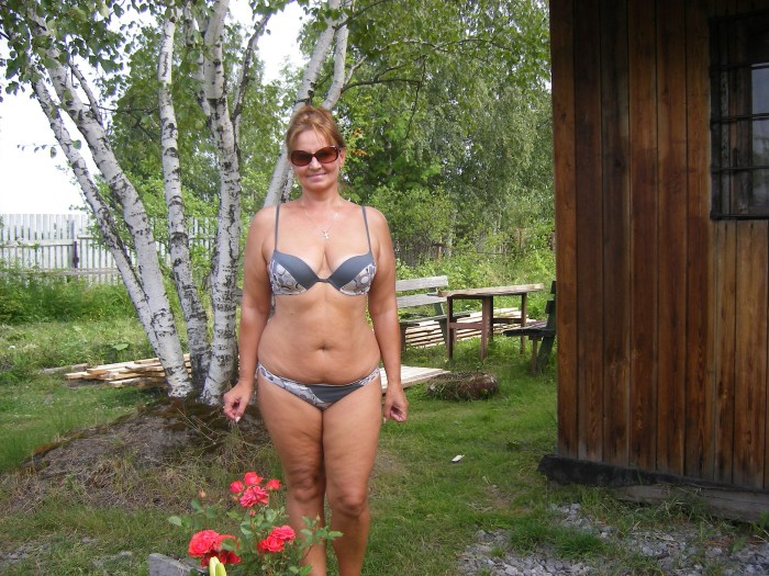 Women at the dacha in a swimsuit