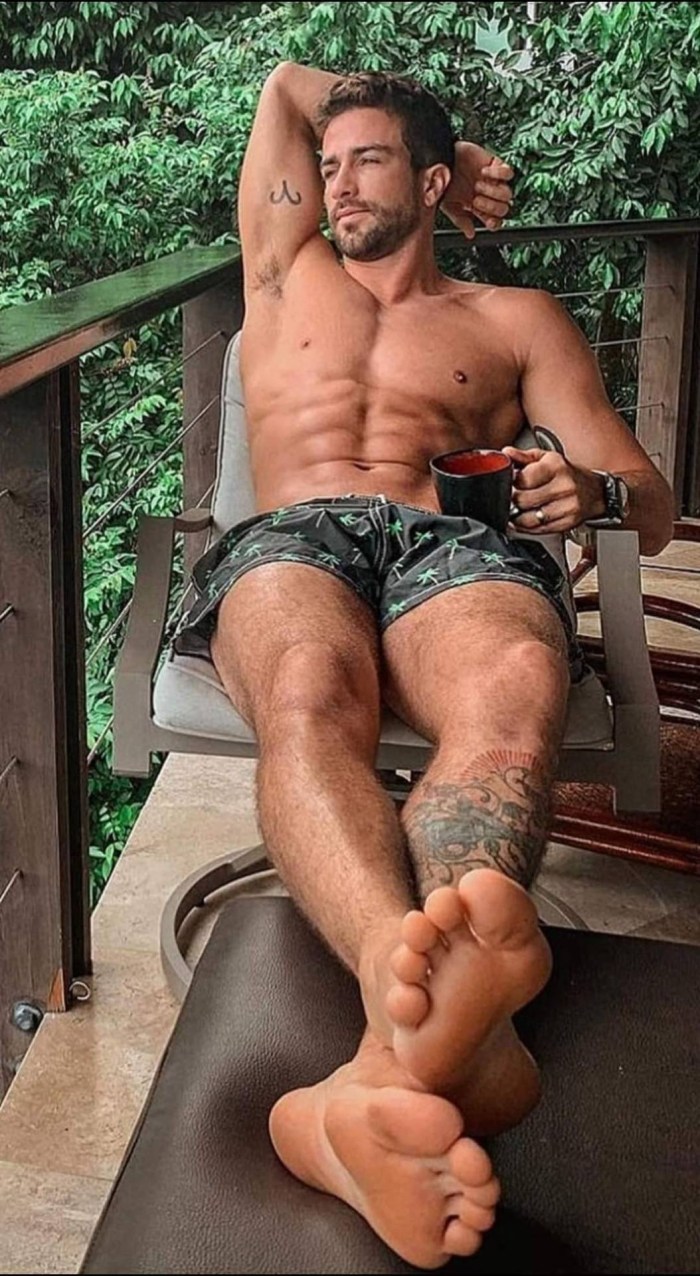 Handsome man in bed