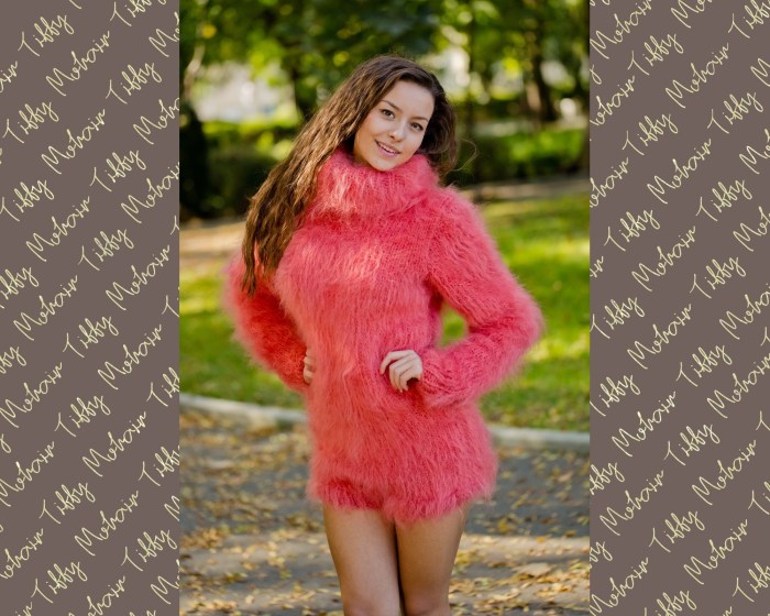 Knitted jumper female oversize with knitting needles scheme
