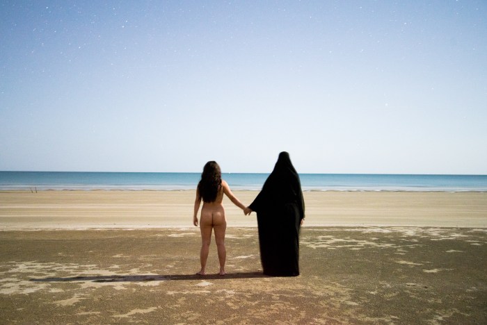 A guy with a girl on the beach