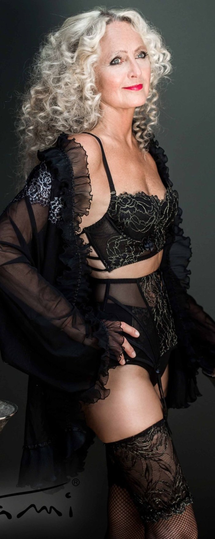 Mature in a transparent bra