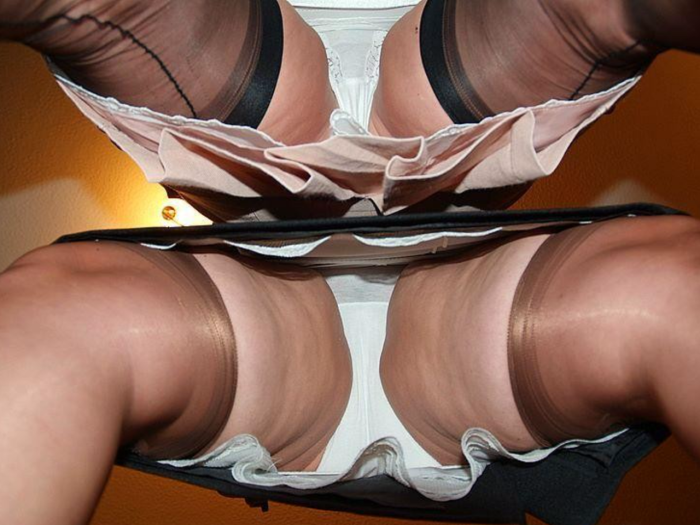 Mature in panties under the skirt
