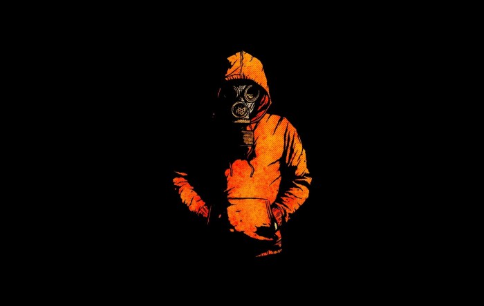 Girl in a mask in the dark