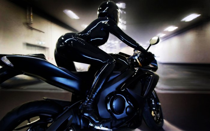 In latex on a motorcycle