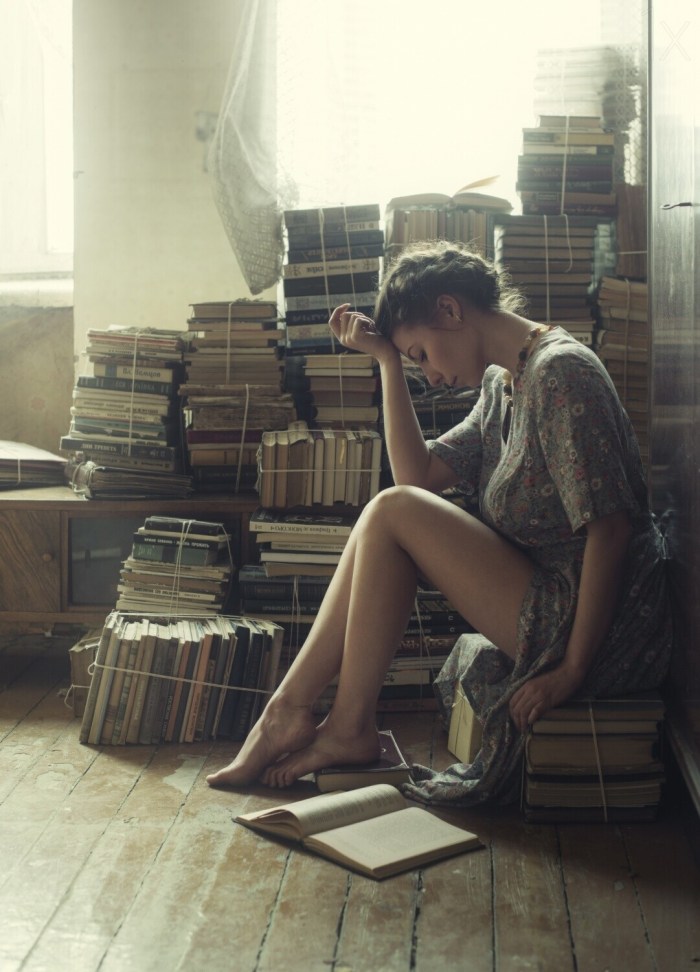 Photo shoot with books on the floor