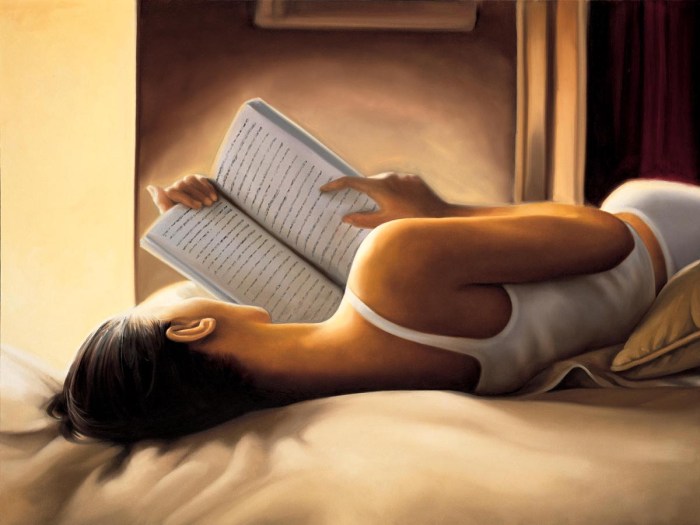 Reads a book in panties