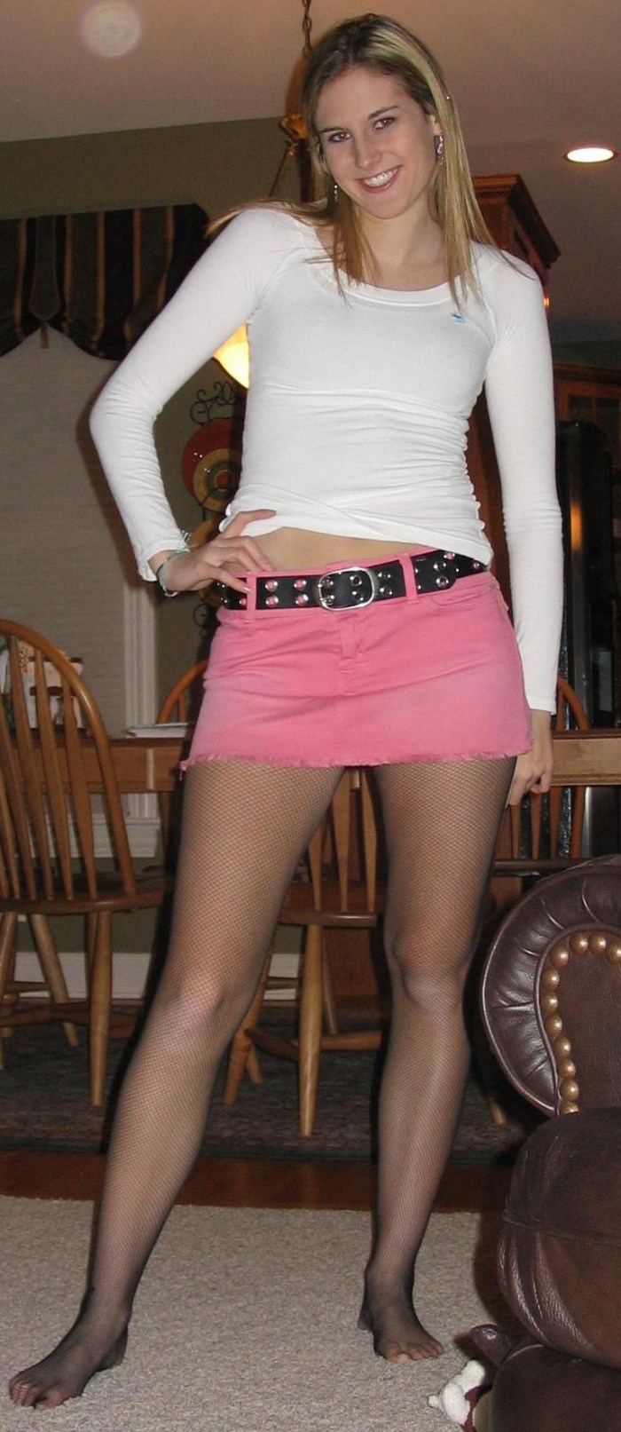 Legs in tights under the skirt