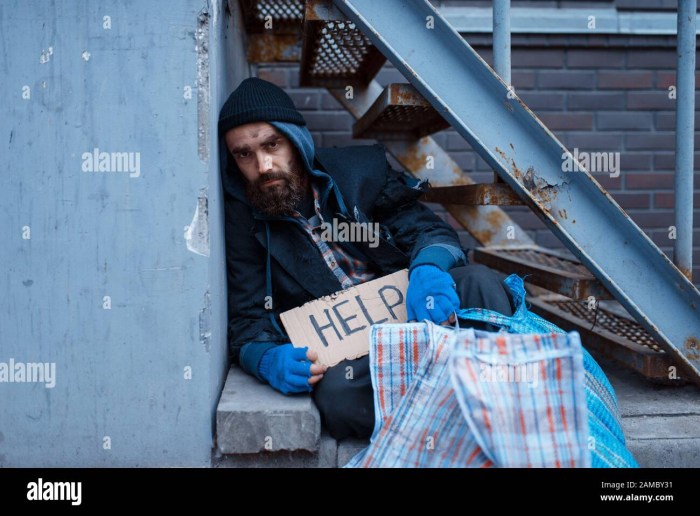 Photo of a homeless person who smiles an alcoholic