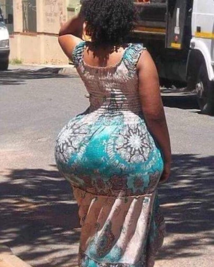 Huge buttocks in a dress