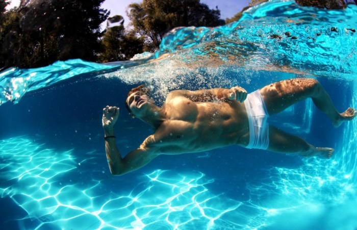 Naked man underwater
