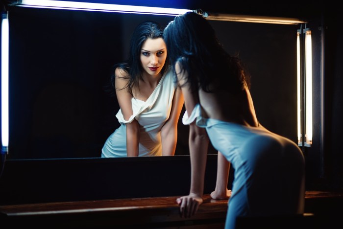 Reflection of a girl in the mirror
