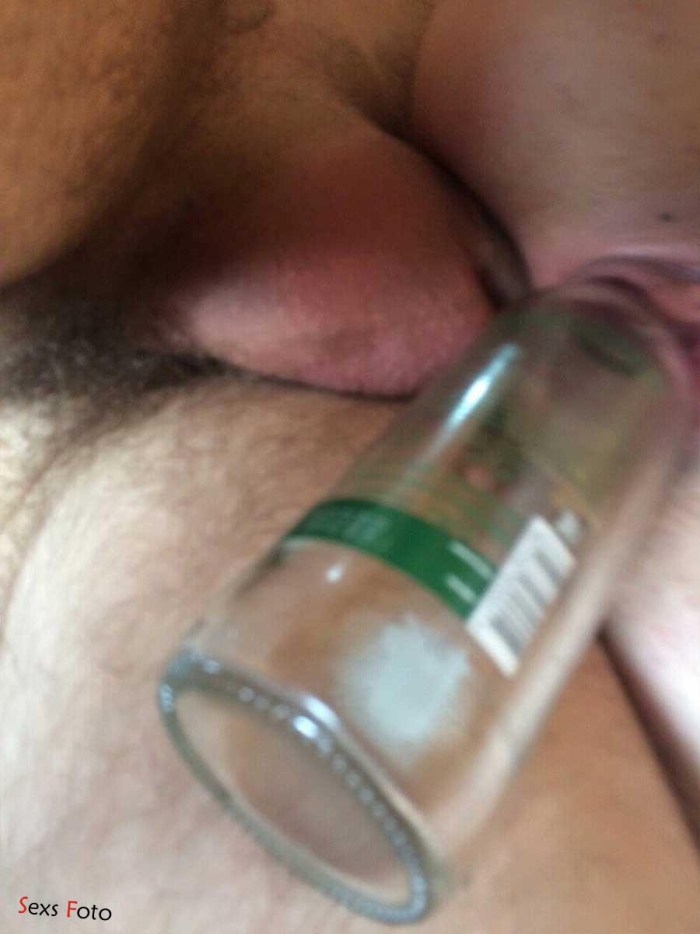 Champagne bottle in the vagina