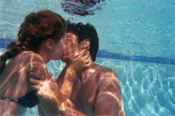 Boy and girl in the pool