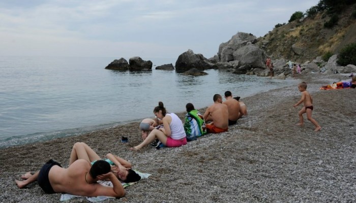 Family on a wild beach