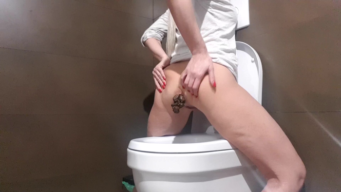 Pooping Mature Womans in the Country Toilet
