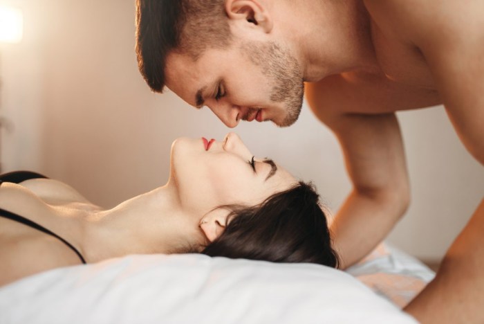 Romantic kiss in bed