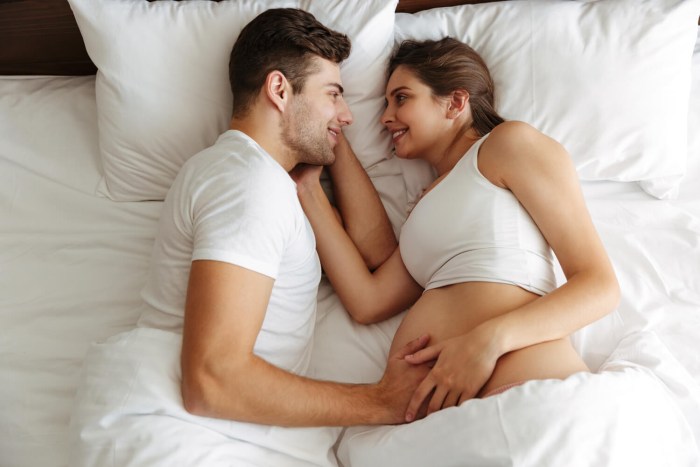 Romantic kiss in bed