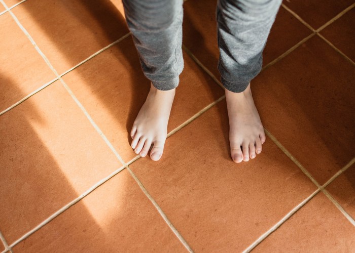 The feet of children in bed