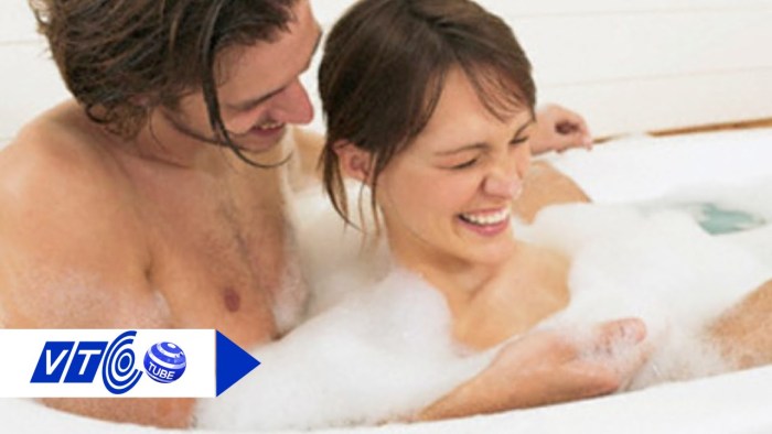 A couple in love in a broken bath