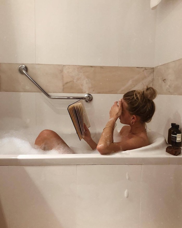 Beautiful body of a girl in a bath