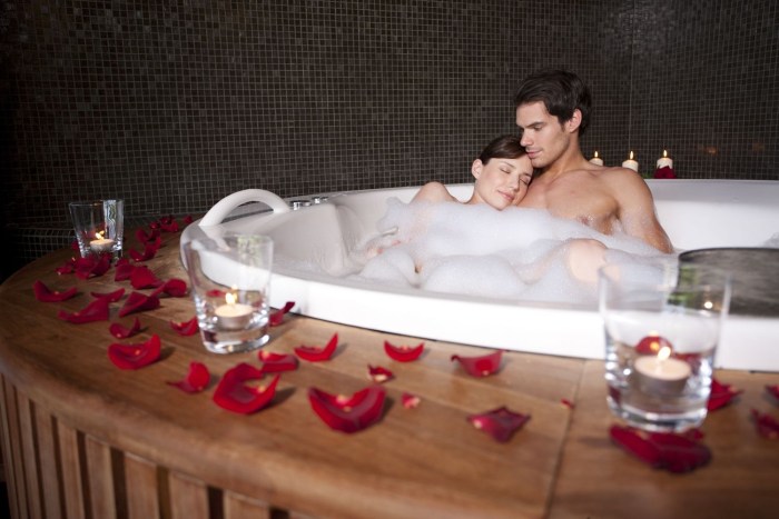A guy with a girl in a bath